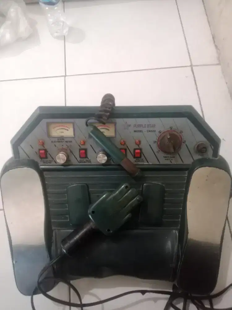 Purple star alat pijat elektrik