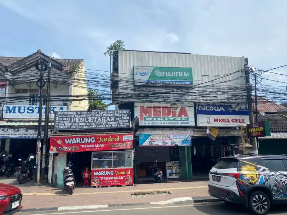 Dijual Rumah + Toko + Tanah kosong