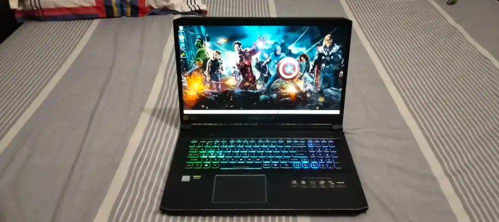 Acer Predator Helios 300
i7 9750H Ram 32GB  1TB  RTX 2070 8GB