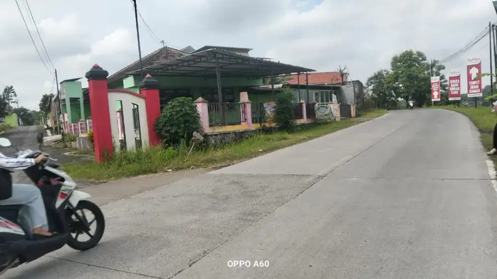 Jual rumah pinggir jln raya mayor Ahmadi lt 257mtr hrg 1Myd nego