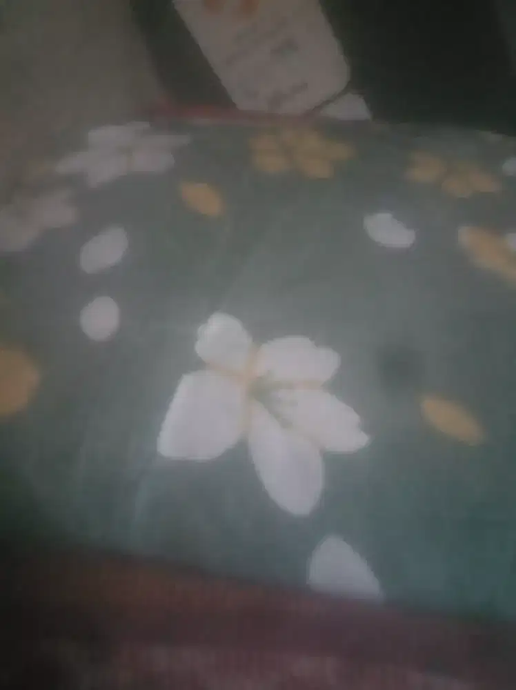 Mukena islami motif bunga