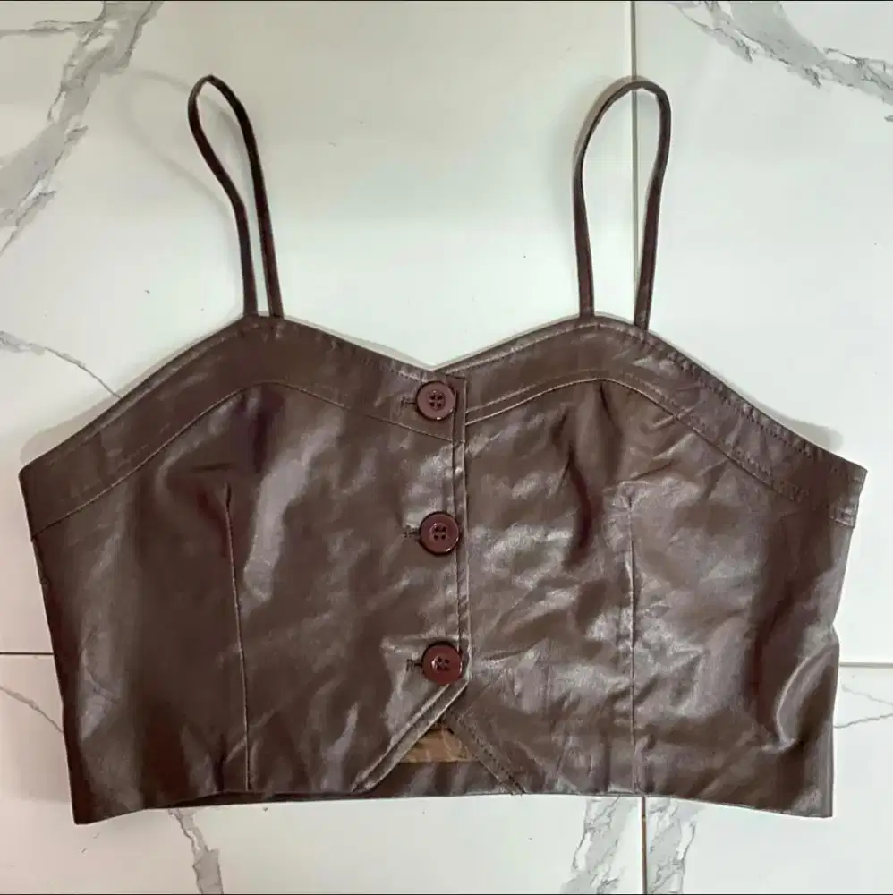 tengtop kulit coklat