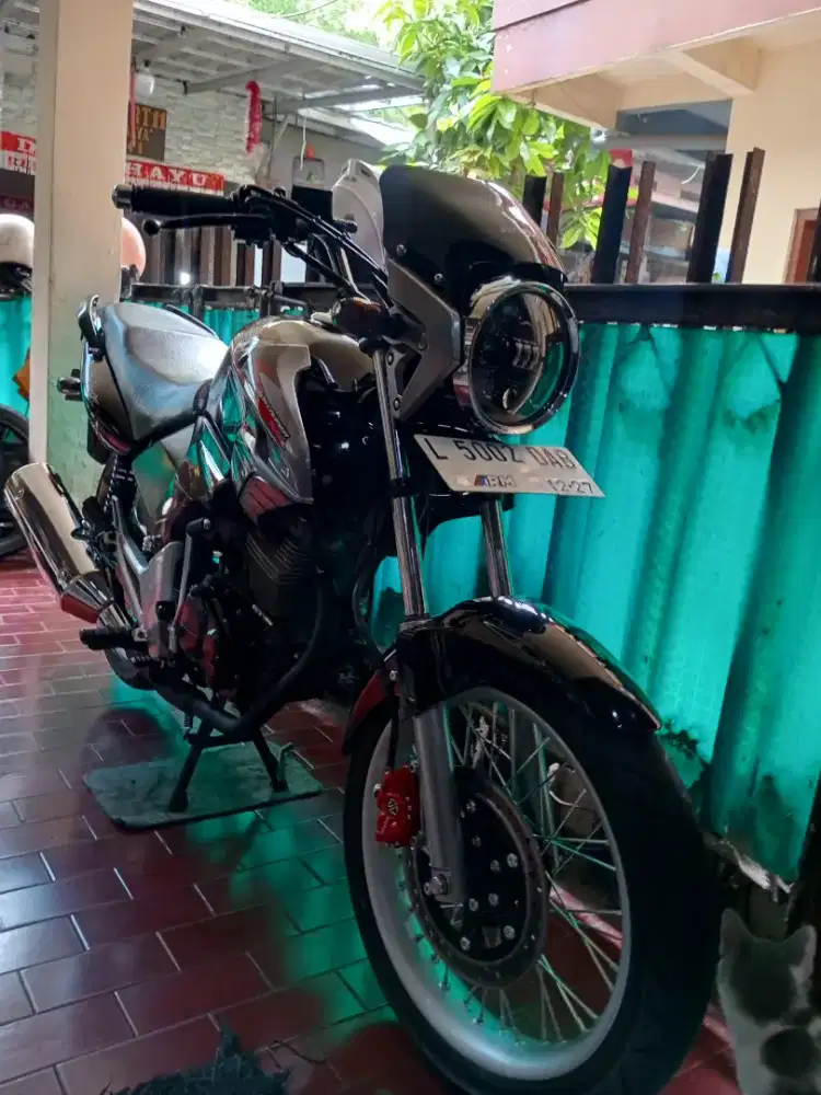 tiger revo plat L tahun 2012