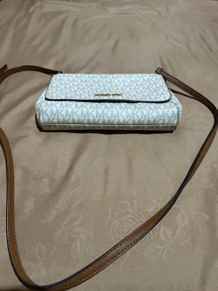 Prelove tas MK sling bag authentic