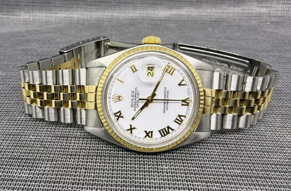 Rolex date just steel gold
