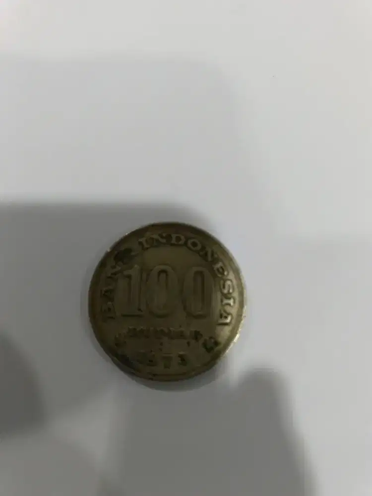 Koin Kuno Rp100 tahun 1973