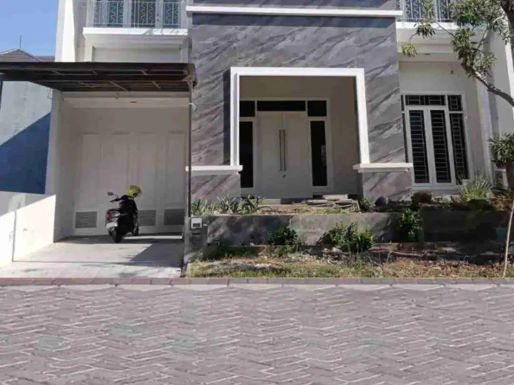 Dijual Rumah Terawat Siap Huni di Citraland Utama Blok Depan Surabaya Barat Semi Furnish