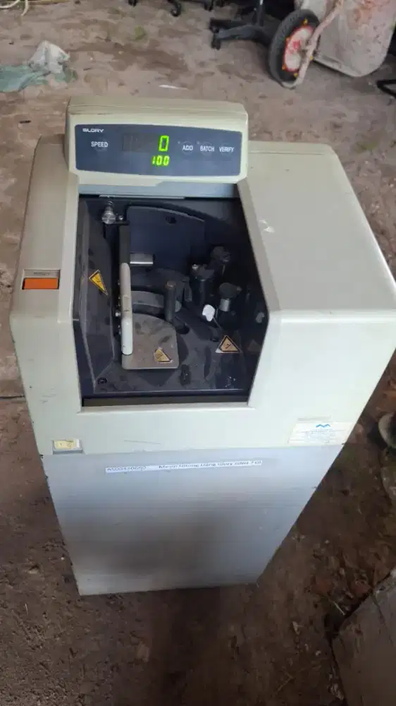 Mesin hitung uang merk Glory GNH710