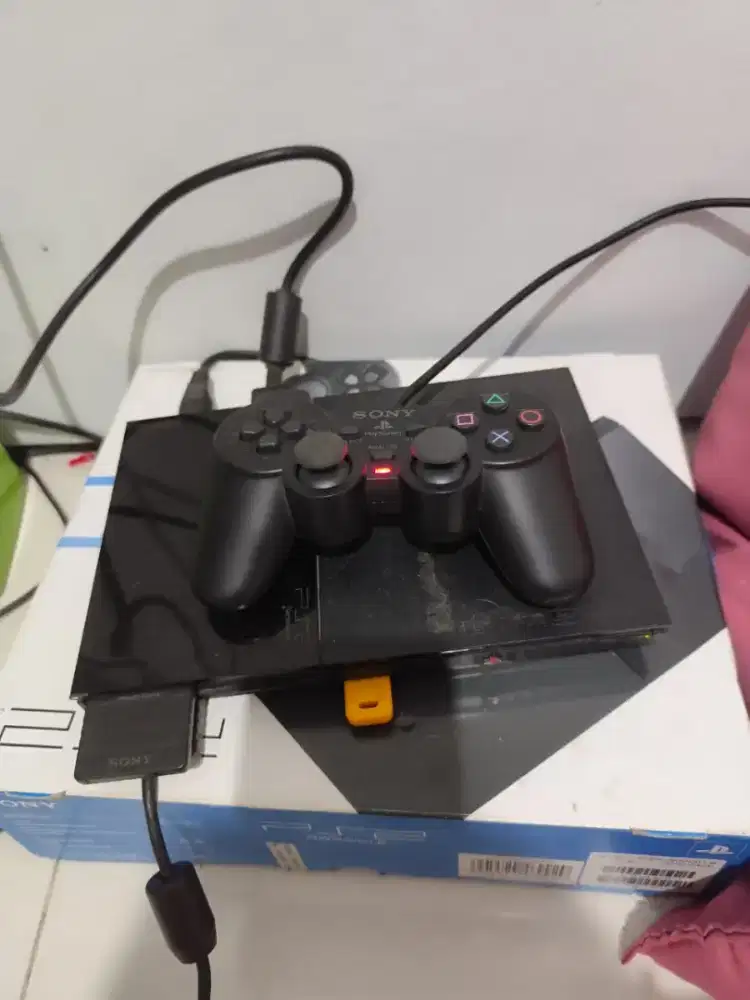 PS2 masih bagus dan lengkap dengan dosnya