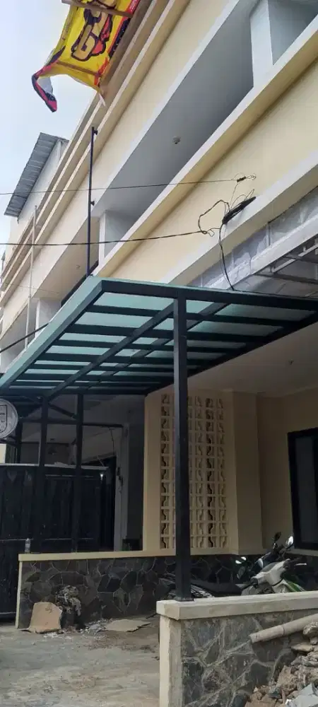 Kanopi kaca tempered