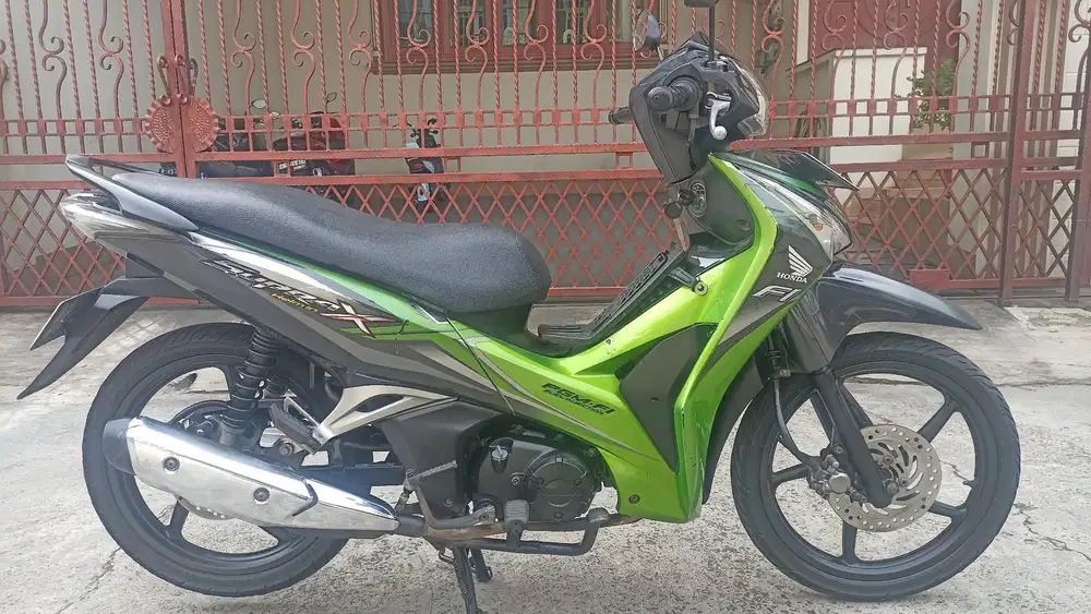 Honda Supra X 125 F1 helm in tahun 2013.