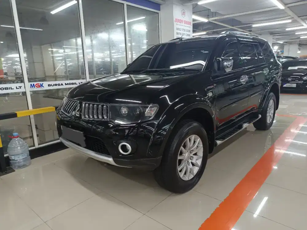 Pajero Exceed sport 4x4 disel matic tahun 2009 warna hitam