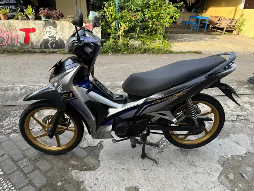 Supra helm in THN 2011 plat AB Bantul