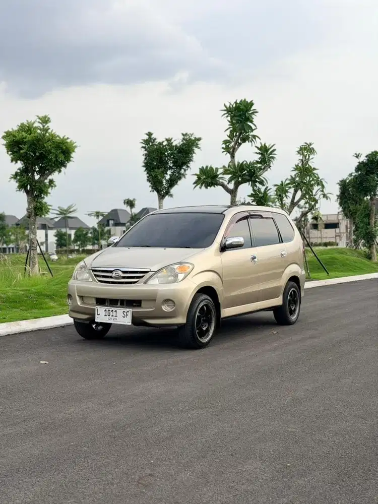 XENIA XI 1.3 MT 2004 - TANGAN 1