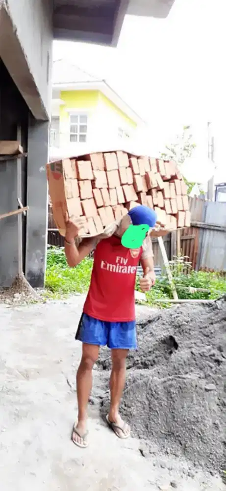 Tukang lansir bongkar muat