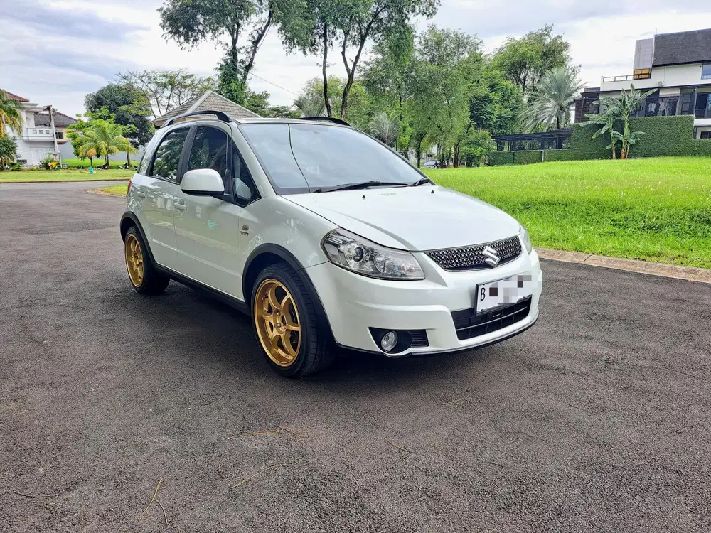 Suzuki SX4 2012 Bensin