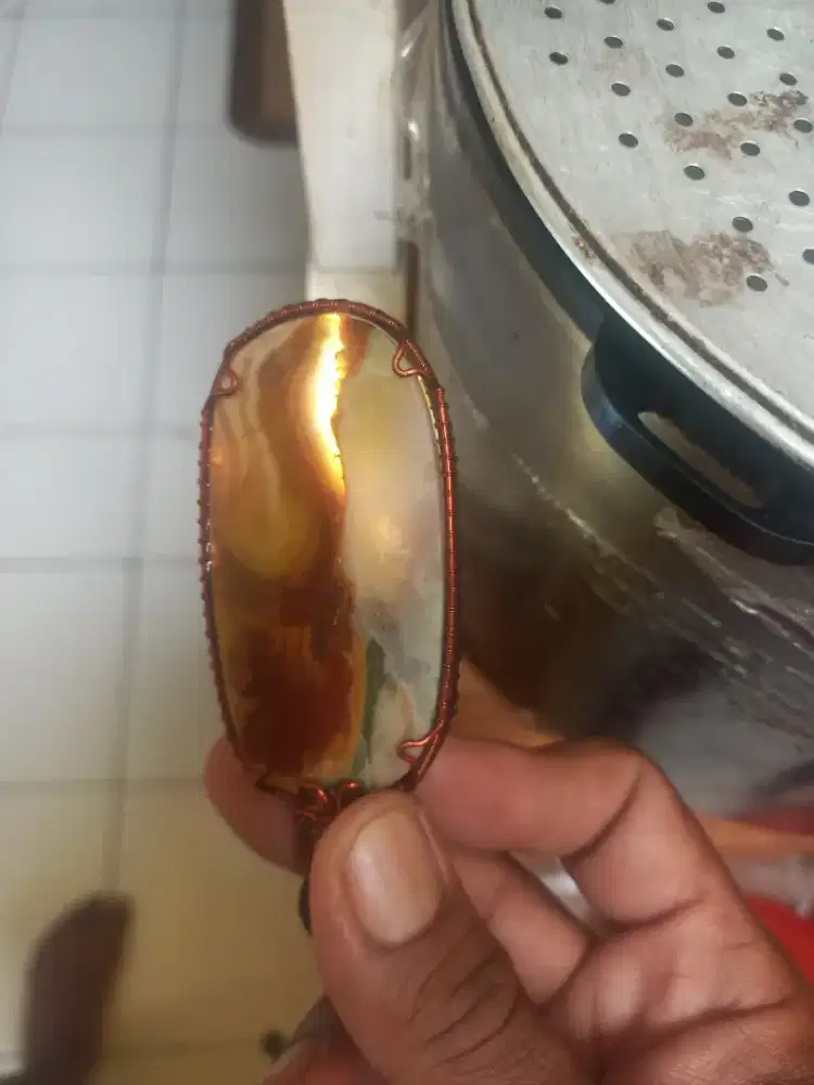 Kalung batu panca warna tembus