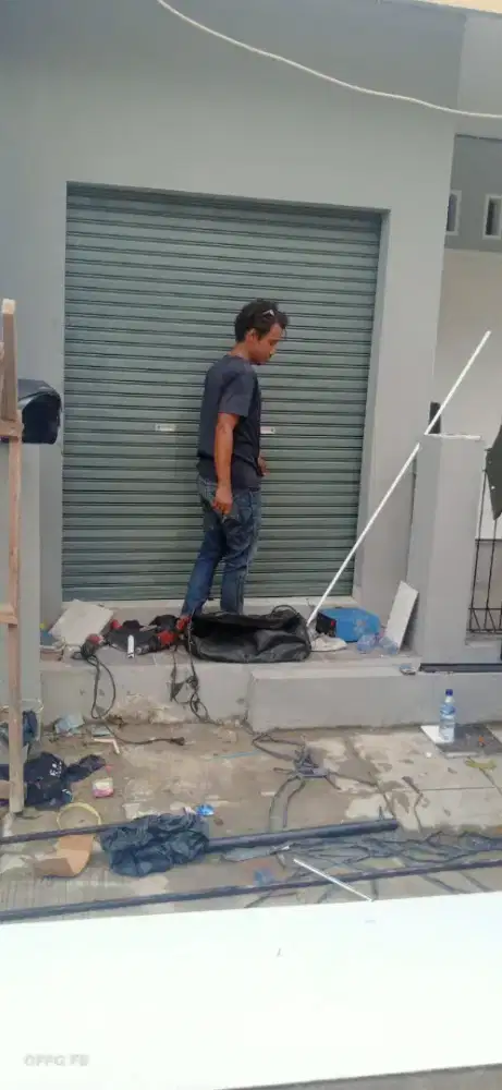 Ahli perbaikan rolling door panggilan termurah