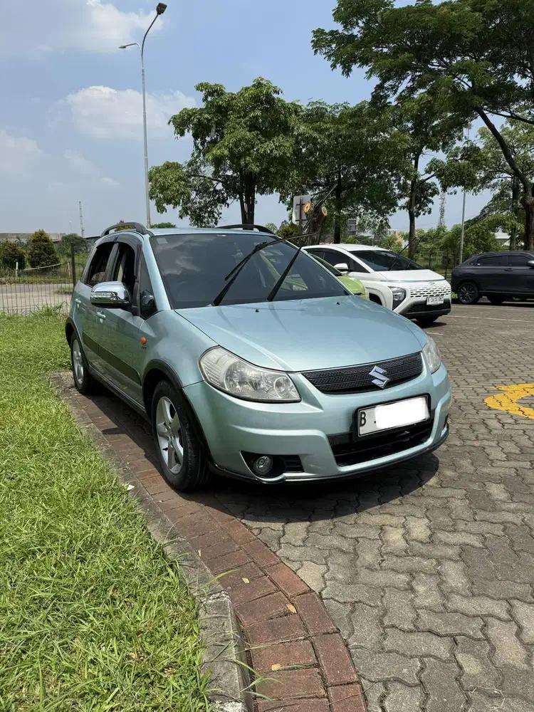 Suzuki sx4 xover biru matic 2008 Siap Pakai banyak upgrade