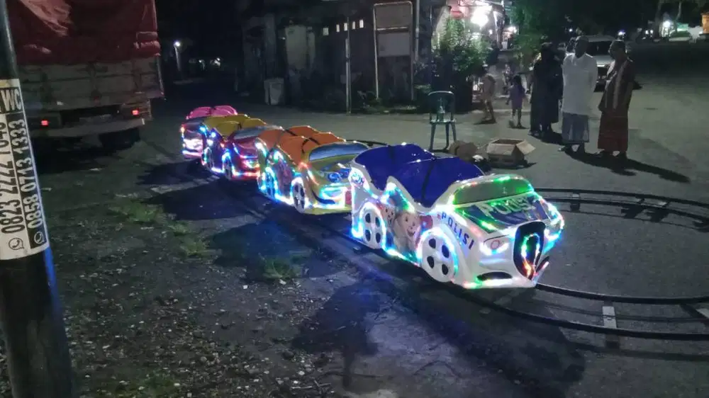 Odong odong Kereta Pnaggung Waha Mini Coaster Rell Naik Turun