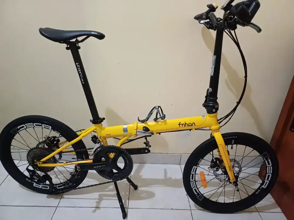 Sepeda lipat Fnhon Storm warna kuning, uk 22, speed 2x11