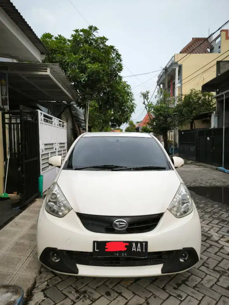 Daihatsu Sirion Deluxe Putih AT Automatic 2013