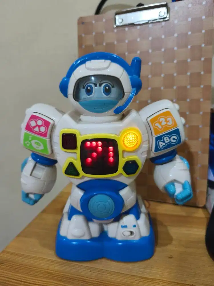 Dancing bilingual learning robot