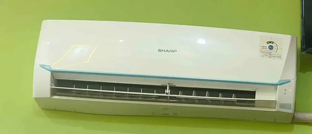 AC merk sharp 1/2 pk lengkap: indoor , outdoor, briket & remote