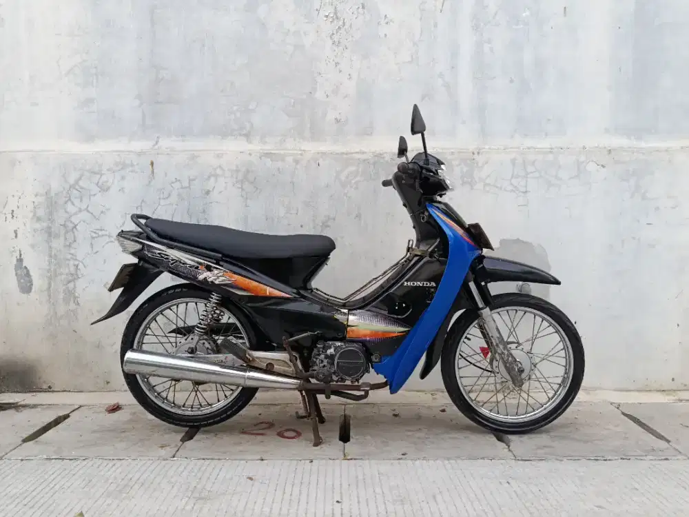 Honda Supra Fit Tromol 2003 Terawat