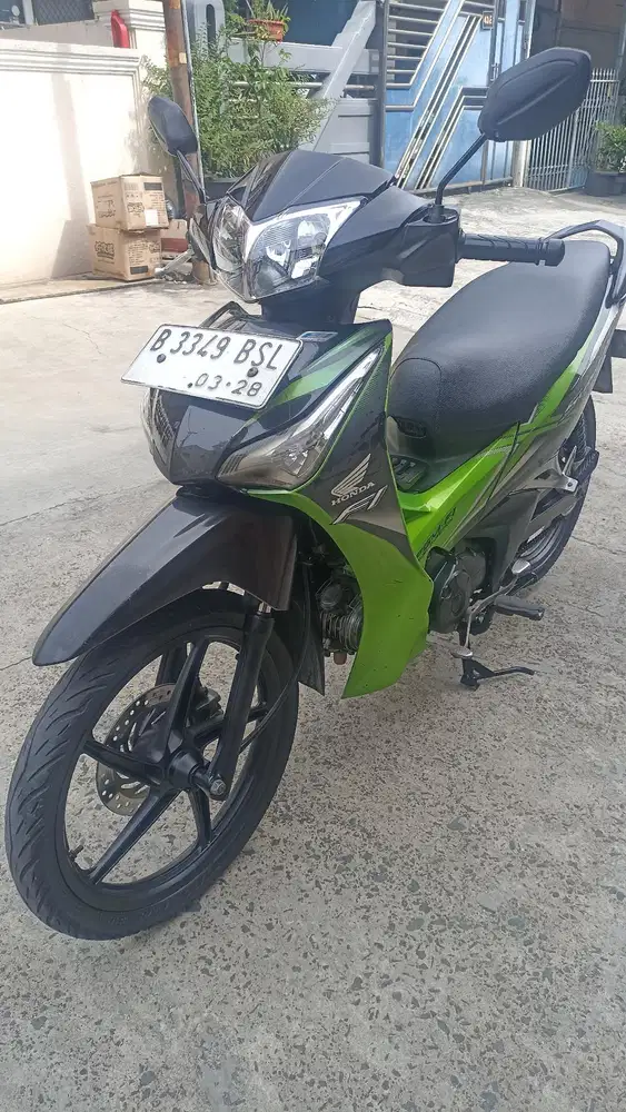 Honda Supra X 125 F1 helm in tahun 2013.