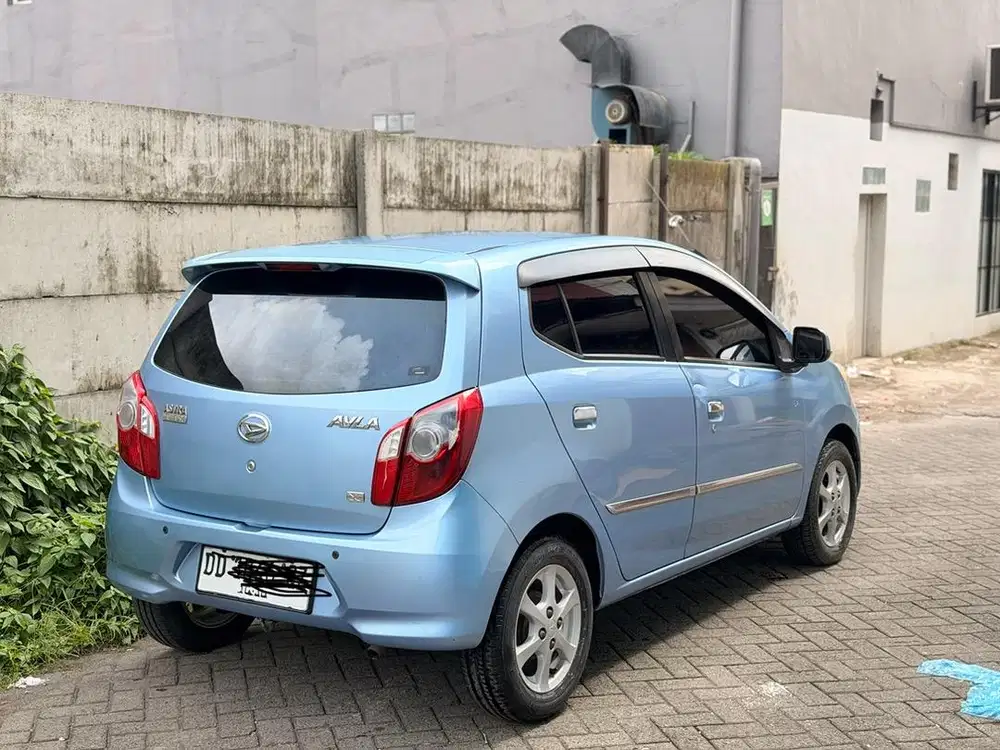 Daihatsu ayla tipe x irit bbm