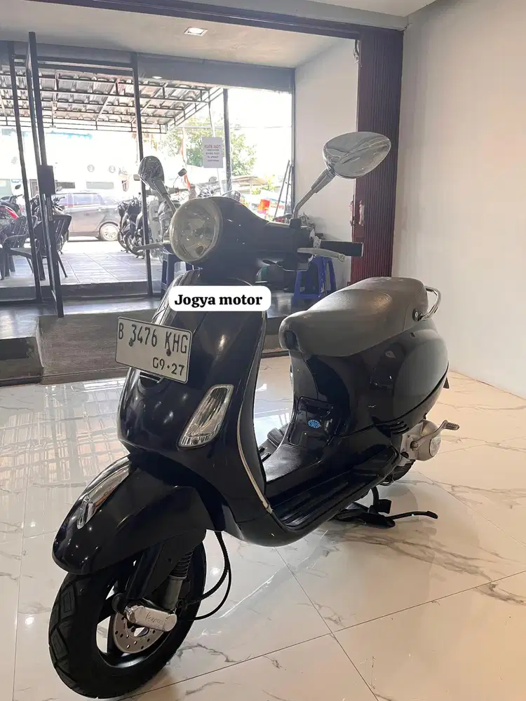 1 - vespa lx 125 th 2012