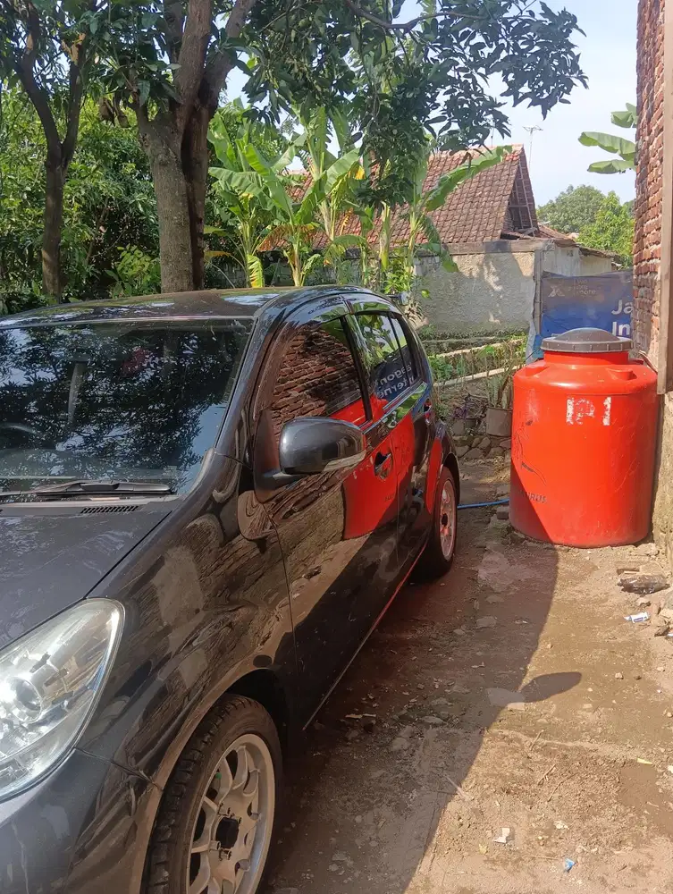 Daihatsu Sirion 2012 Bensin