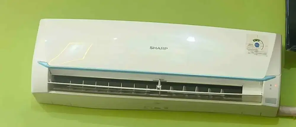 AC merk sharp 1/2 pk lengkap: indoor , outdoor, briket & remote