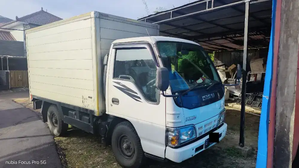 Isuzu elf nkr 55 dengan ac