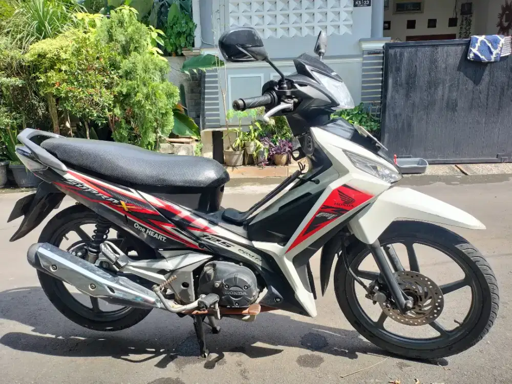 Supra x 125 PGM F1 2015