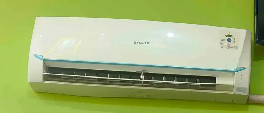 AC merk sharp 1/2 pk lengkap: indoor , outdoor, briket & remote