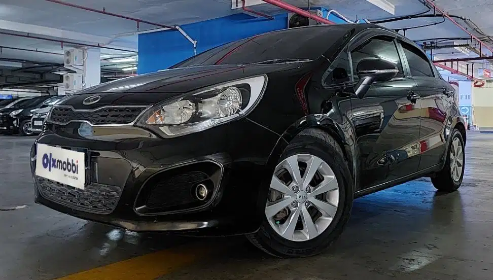 TDP 6,JT Kia Rio 1.4 Bensin-AT Putih 2014