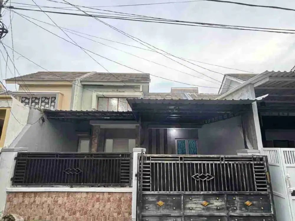 rumah di bawah pasar