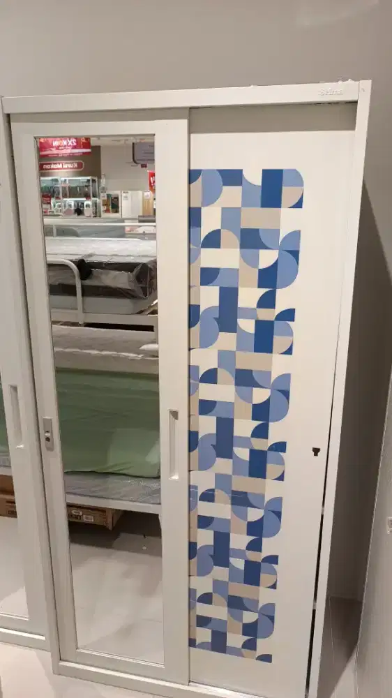 lemari besi sliding+ kaca