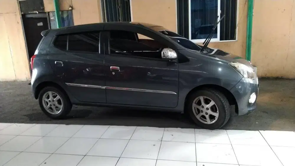 DP 5 JT Daihatsu Ayla X 1.0 Matic 2013 Grey Mulus Terawat