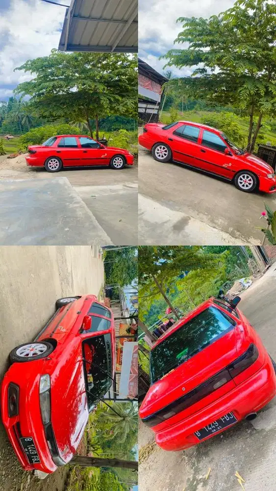 Di jual mobil sedan timor warna merah