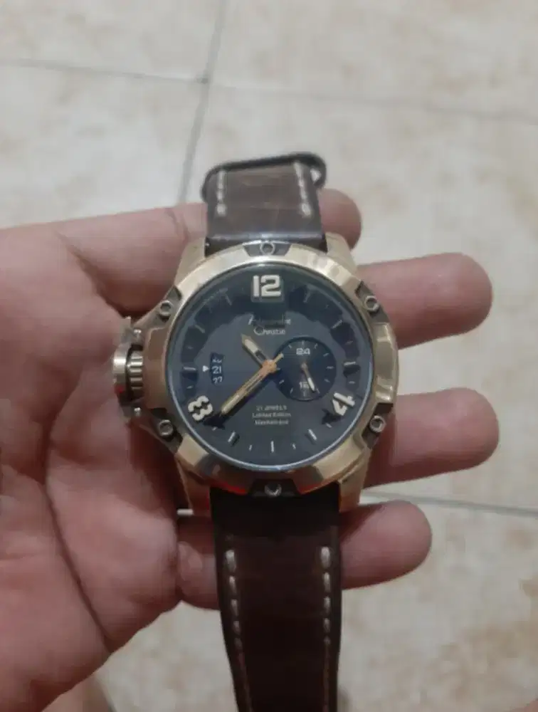 Alexander Christie bronzium bukan Seiko