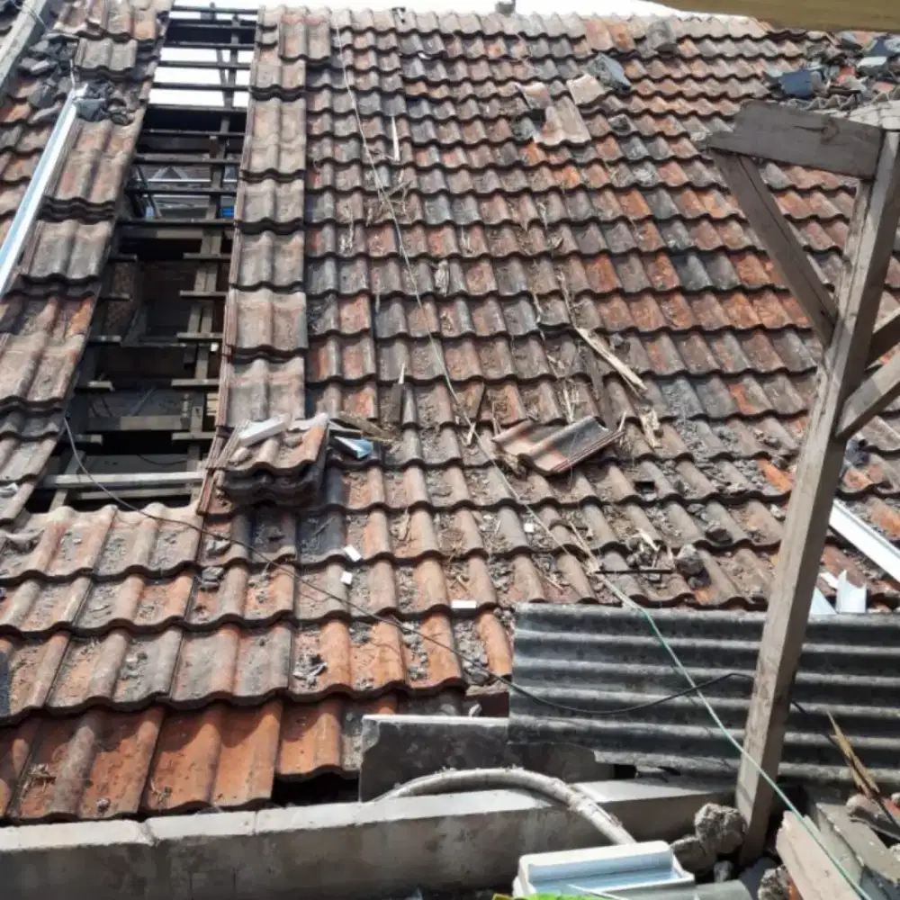 Tukang bangunan, perbaikan atap bocor, plafon rembes,talang air, dll