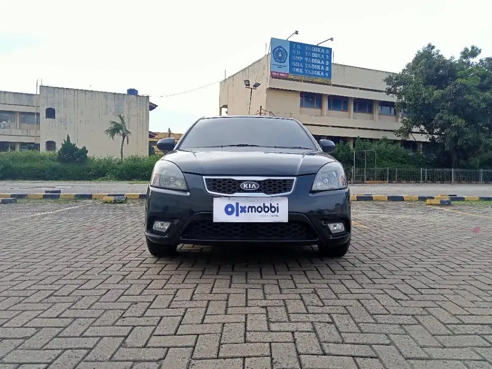 TDP 5,JT Kia Rio 1.4 Bensin-AT Merah 2012