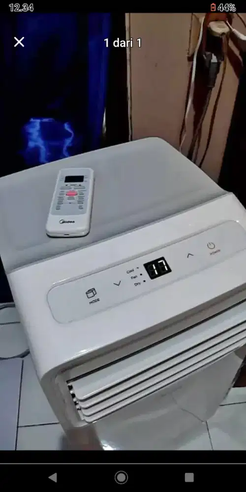 ac portable midea 0.5 pk