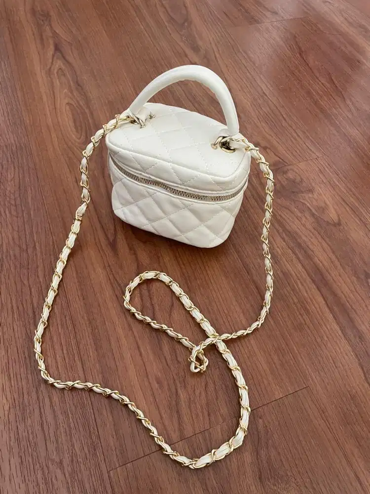 Slingback bag broken white leather