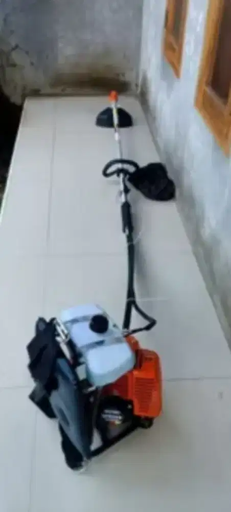 Alat pemotong rumput supra 328 expert