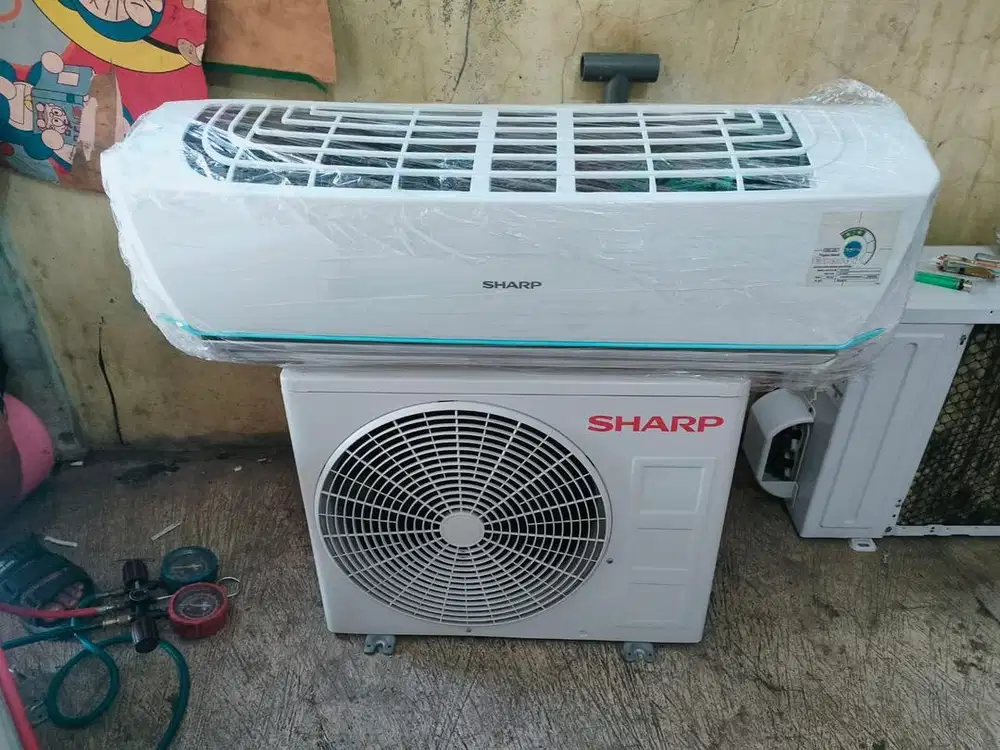 Ac sharp second 0.5 pk kondisi seperti baru 98%
