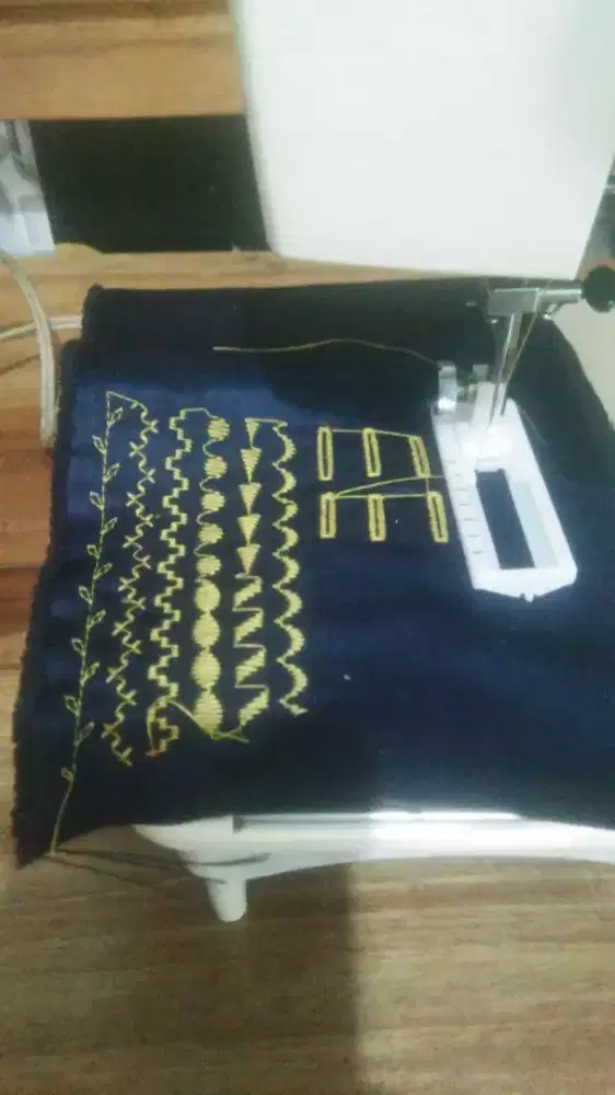 Mesin jahit bordil dan lubang kancing